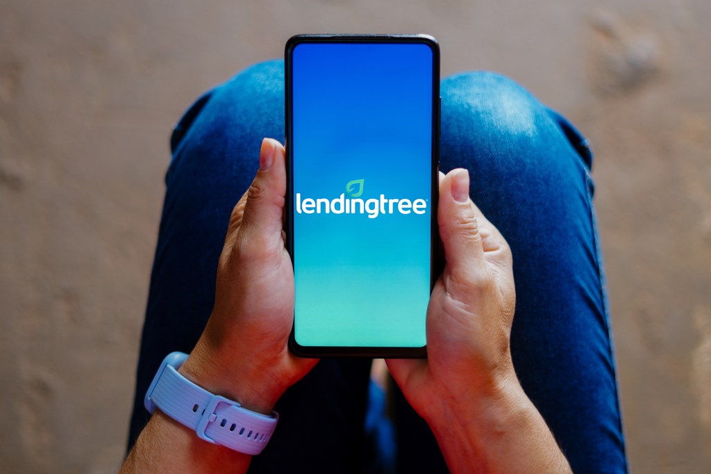 In this photographic illustration, the Lendingtree logo appears on a smartphone screen.