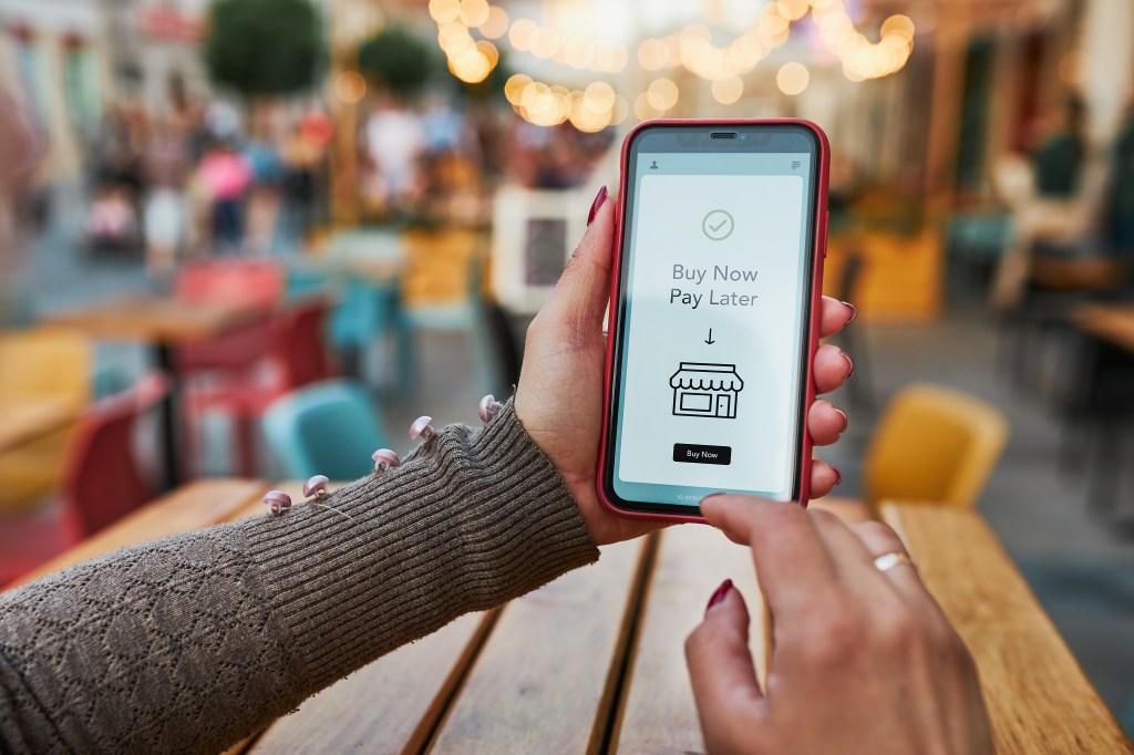 BNPL Buy Now pay later online shopping service on the smartphone.