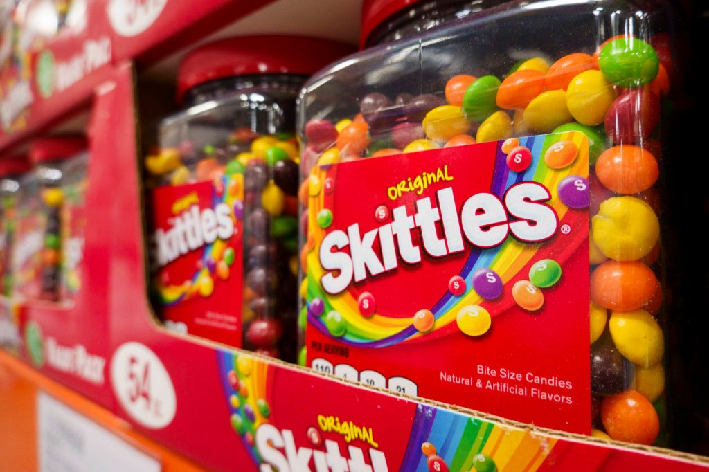 Candy Skittles packages appear in a cost -who wholesale shop on April 27, 2025 in San Diego, California.