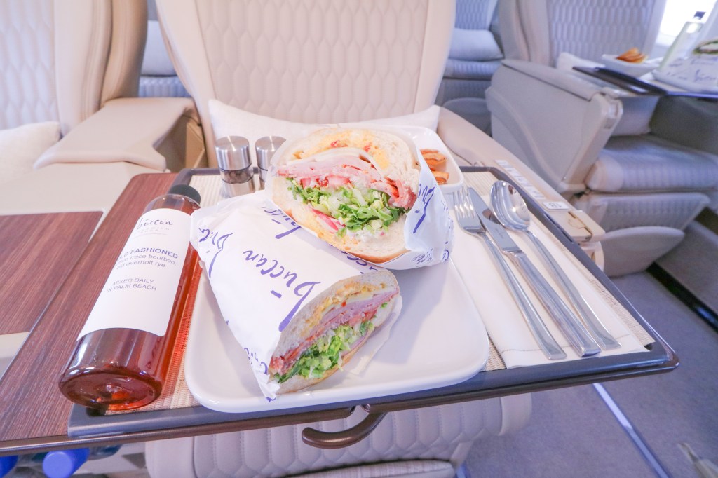Warning service with sandwiches and drinks in tile aviation.