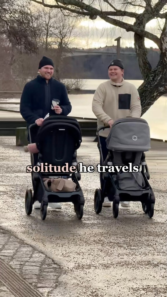 Two fathers pushing the carriages.
