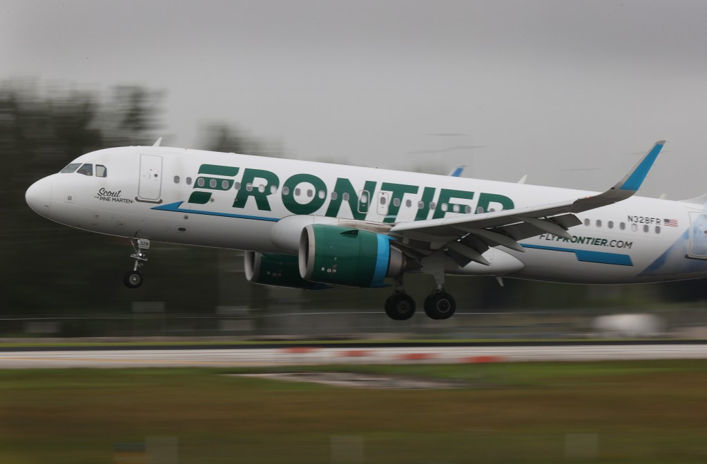 Airlines Airlines Frontier Airlines Landing at Miami International Airport.