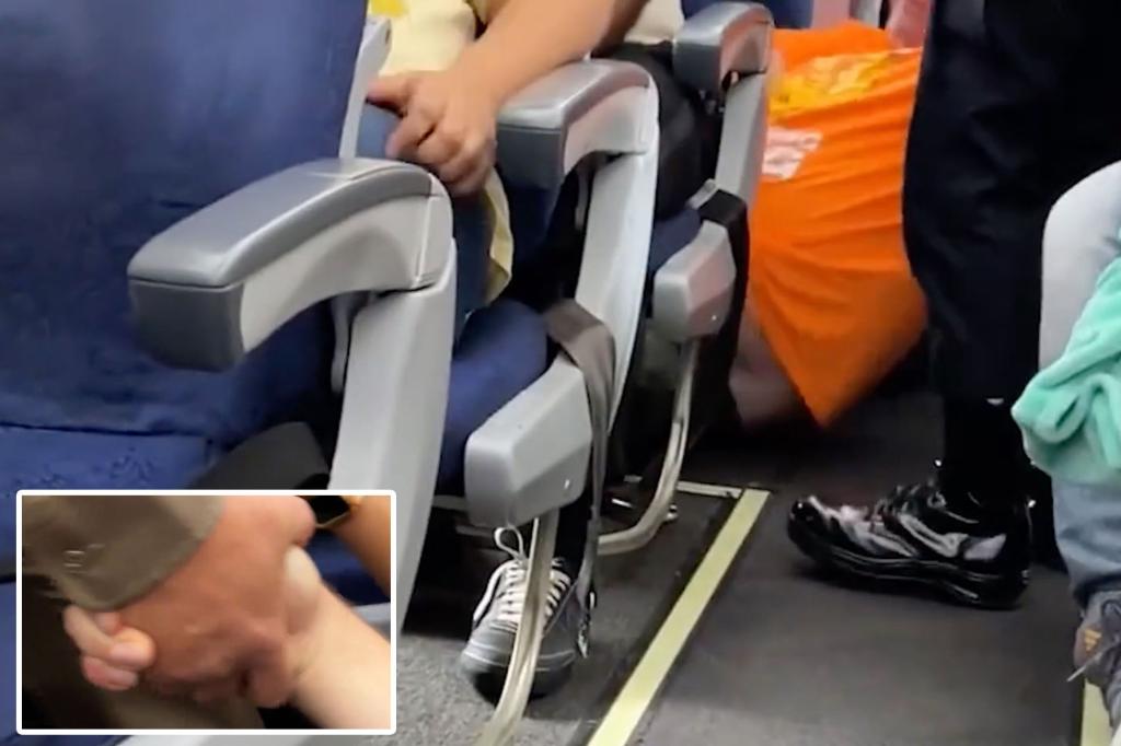 The overweight passenger left the plane over the row's seat 'F -ego' row