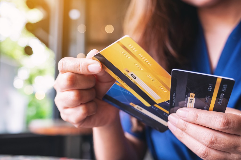 The woman who chooses a credit card.